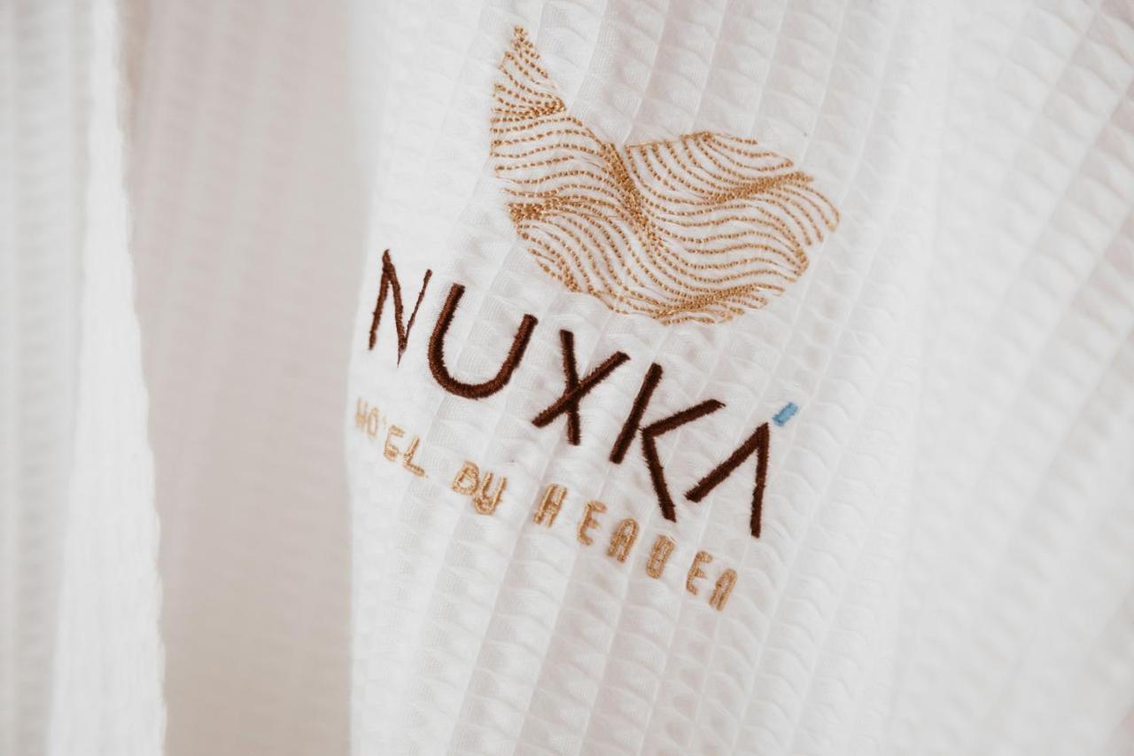 Nuxka Hotel تيلشاك بويرتو المظهر الخارجي الصورة