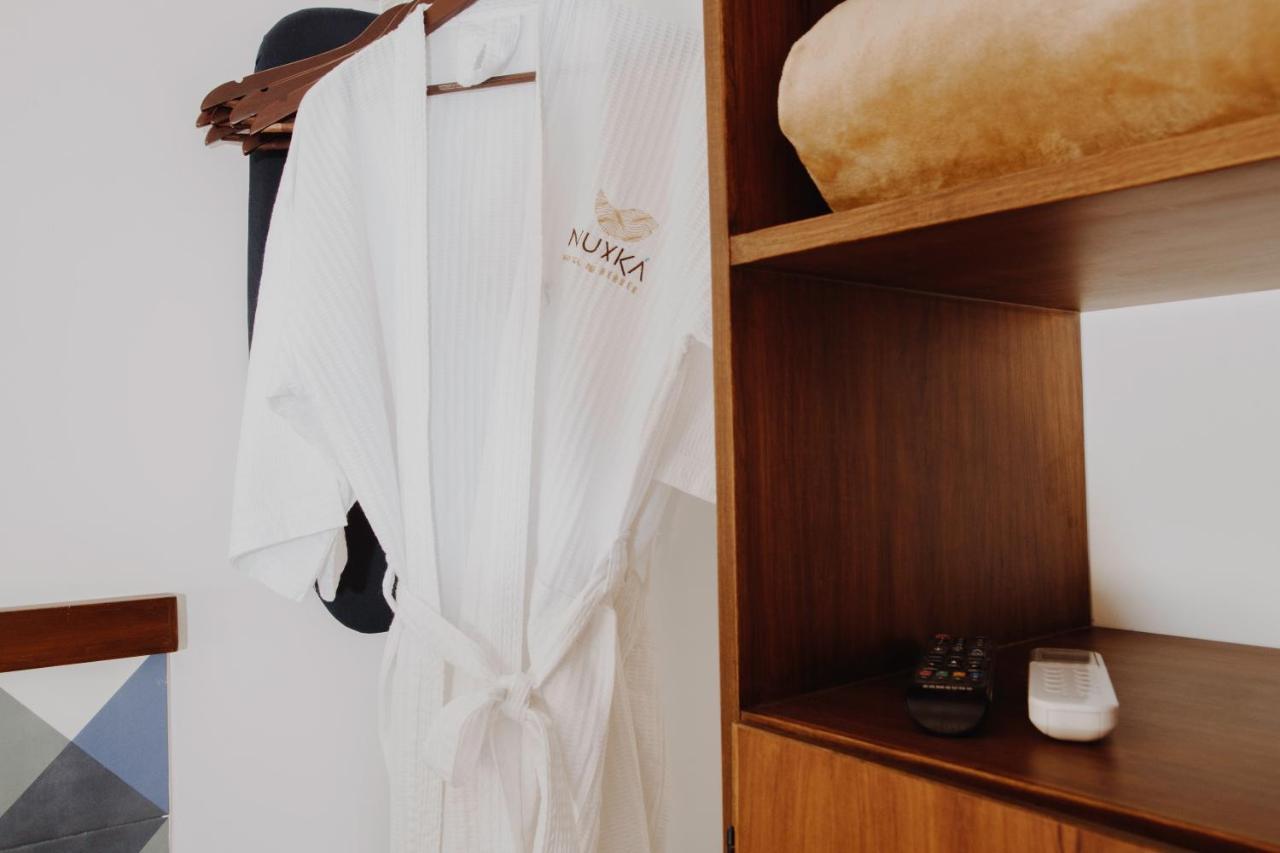 Nuxka Hotel تيلشاك بويرتو المظهر الخارجي الصورة